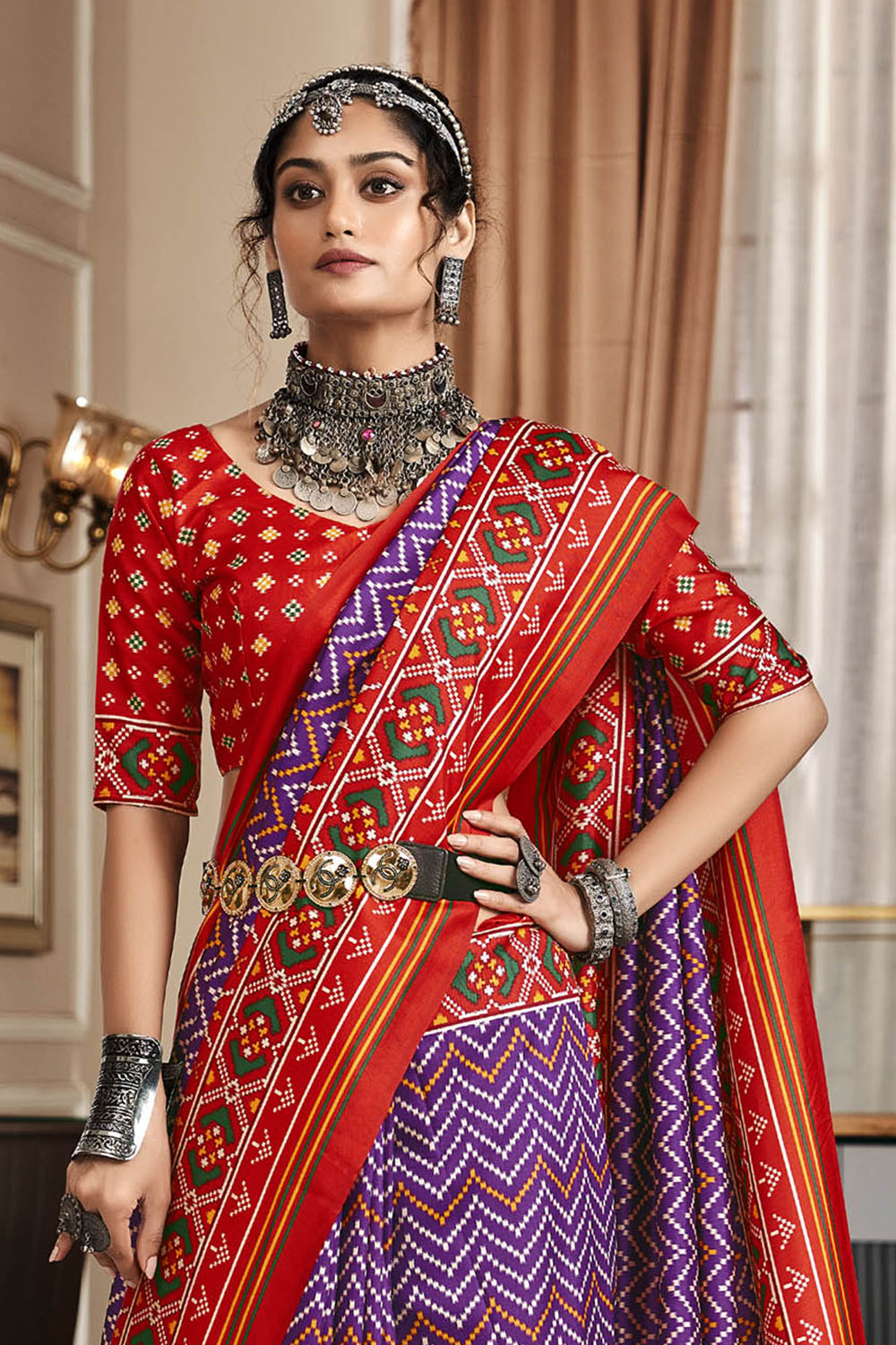 Purple & Ferrari Red Leheriya Style Patola Saree with Fancy Red Blouse