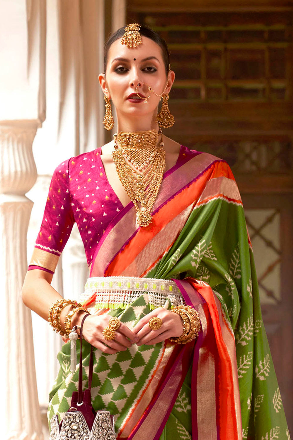 Kelly Green & Hot Pink Border Patola Saree with Pink Fancy Blouse
