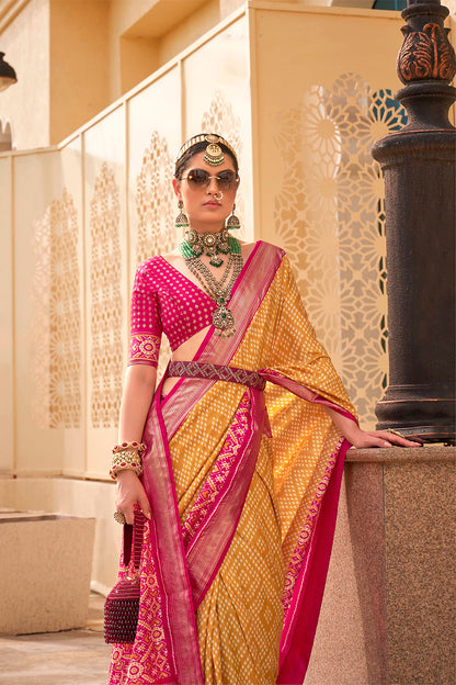 Amber Yellow Patola Saree with Ruby Pink Pretty Blouse