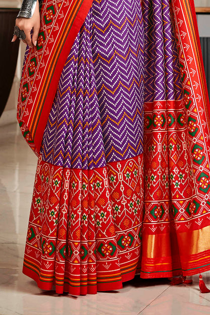 Purple & Ferrari Red Leheriya Style Patola Saree with Fancy Red Blouse