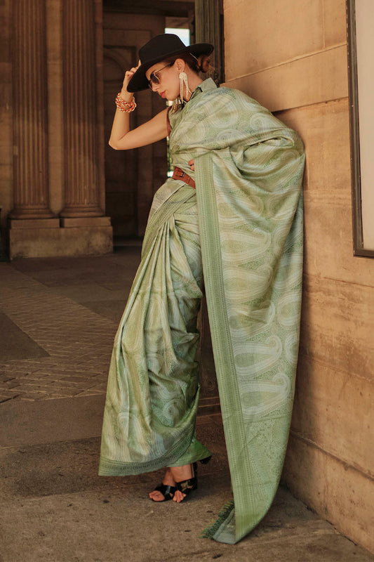Pistachio Green Kanjeevaram Silk Saree with Green Fancy Sleeve Less Blouse