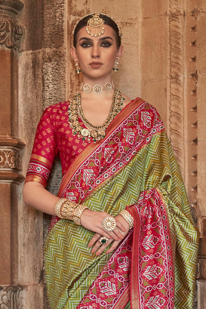 Kelly Green & Carmine Red Border Patola Saree with Red Blouse