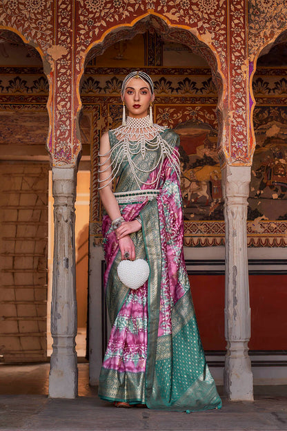 Bubble Gum Pink & Jungle Green Border Patola Saree with Fancy Sleeve Less Blouse