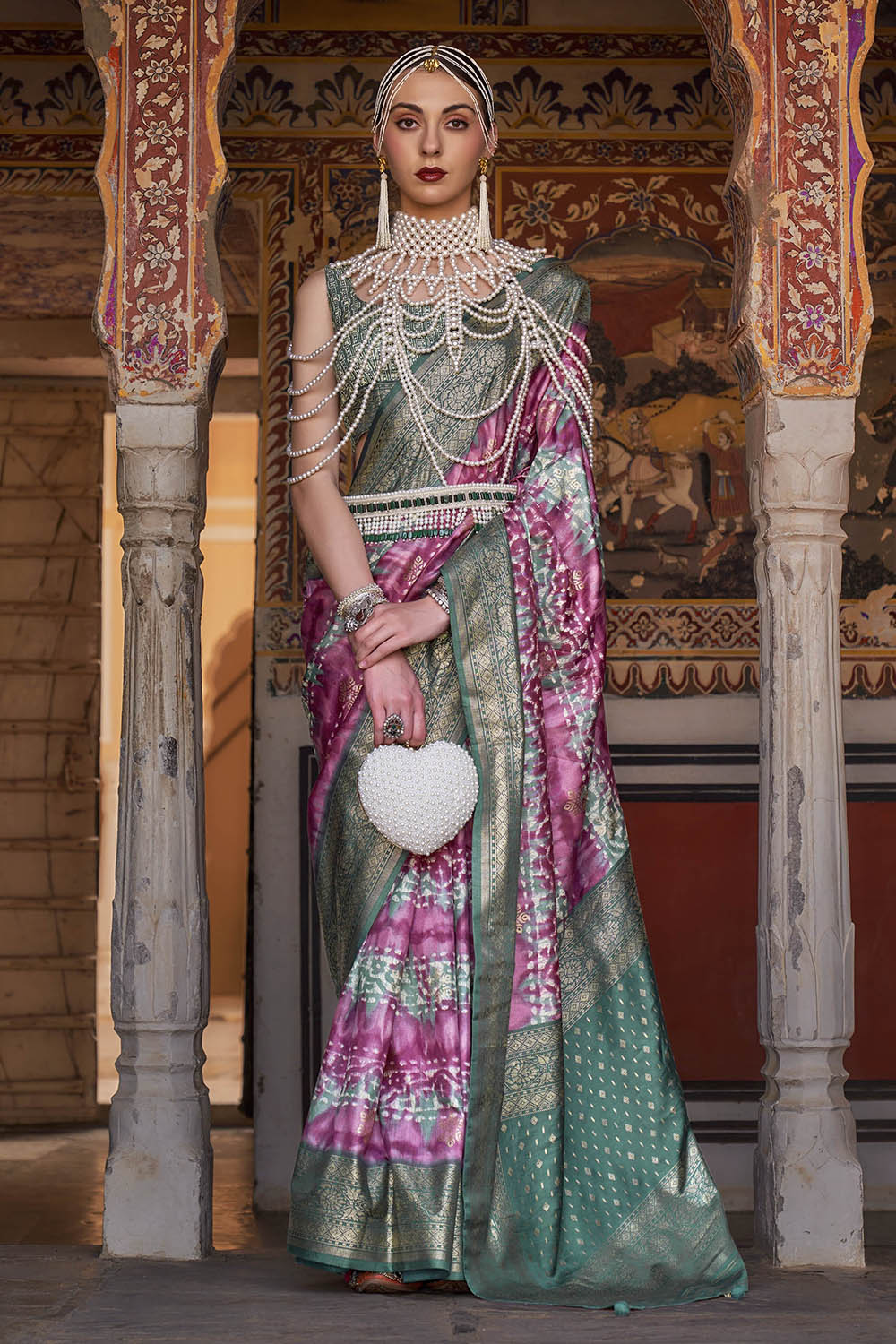 Bubble Gum Pink & Jungle Green Border Patola Saree with Fancy Sleeve Less Blouse