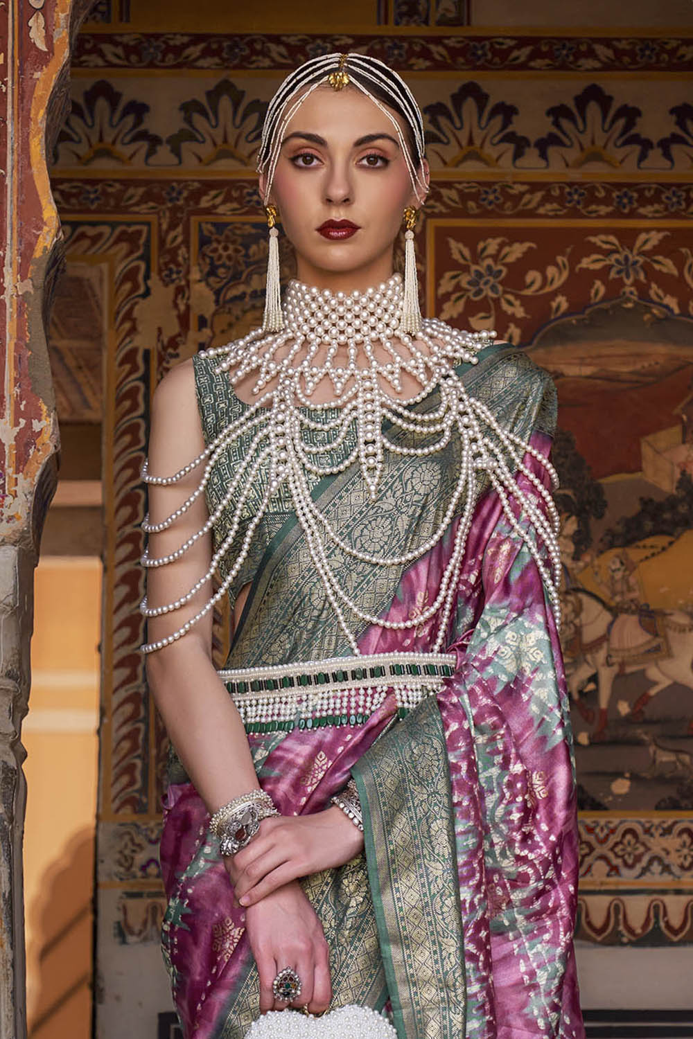 Bubble Gum Pink & Jungle Green Border Patola Saree with Fancy Sleeve Less Blouse