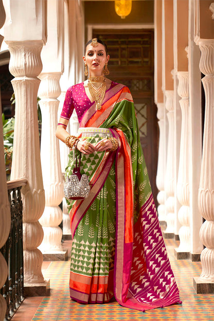 Kelly Green & Hot Pink Border Patola Saree with Pink Fancy Blouse