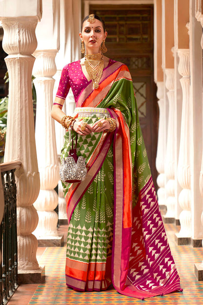 Kelly Green & Hot Pink Border Patola Saree with Pink Fancy Blouse